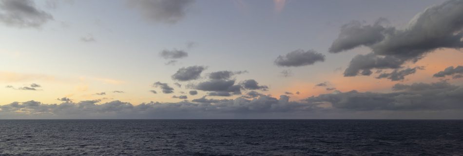 Evening Clouds At Sea